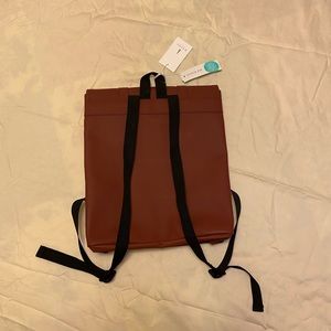 maroon color Rains Backpack
